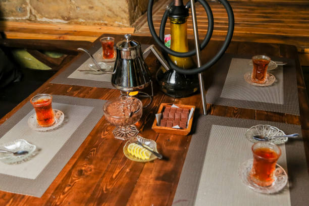 istock Enjoying tea and hookah in a cozy setting with friends 2191665696