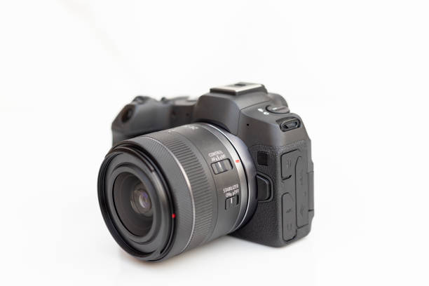 istock New latest model interchangeable lens digital camera for content creators on white isolated background 2191666534