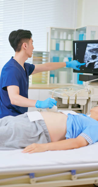 istock elder receive abdominal ultrasound 2191666909