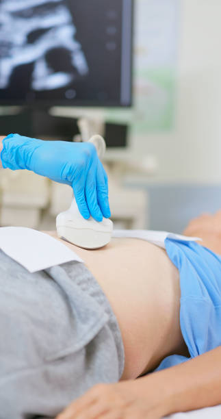 istock elder receive abdominal ultrasound 2191666955