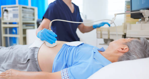 istock elder receive abdominal ultrasound 2191667015