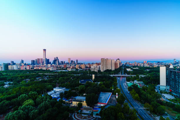 This photo is a high angle view of the skyline of Beijing CBD (Central Business District) in the early morning, which shows the magnificent panoramic scenery of downtown Beijing, China.