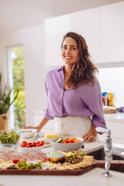istock Beautiful woman in the kitchen 2191672115