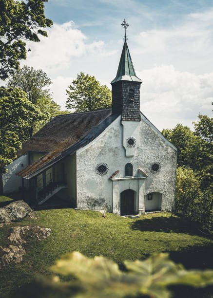istock Church in the bavarian forest with trees aorund 2191672428