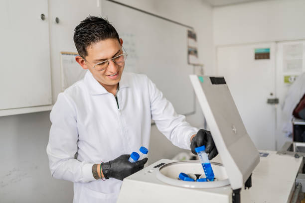 istock Scientists man putting test tube on machine on a laboratory 2191676449