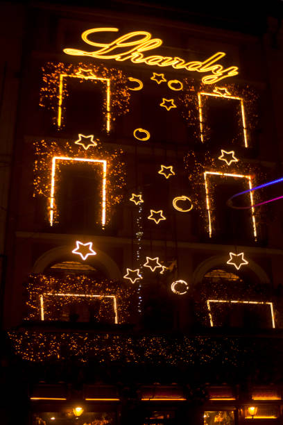 Facade of one of the oldest restaurants in Madrid, Spain since 1839. Christmas lights decoration.