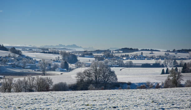 istock winter landscape with the Alps in the backround 2191676638