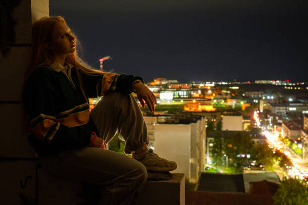 istock Woman on city roof 2191678339