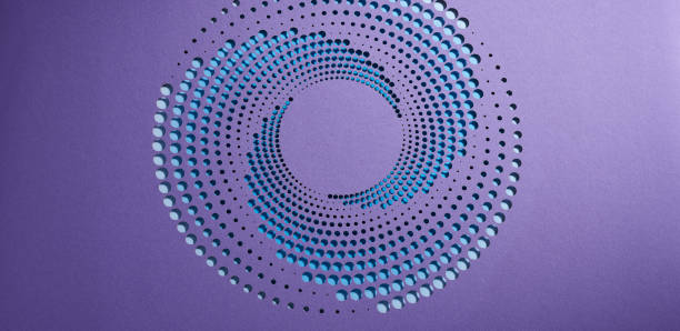 Abstract paper design showcasing a circular vortex of blue and purple gradient cutouts on a vibrant violet surface. The intricate details and contrasting hues create a visually stunning and modern artistic composition.\nNative image size: 10872 x 5304.