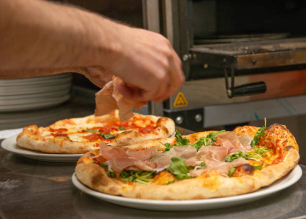 istock Freshly baked pizza ready to be eaten 2191679211