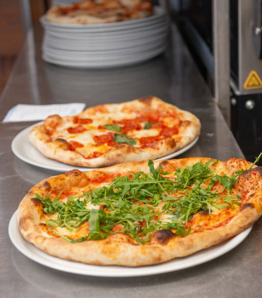 istock Freshly baked pizza ready to be eaten 2191679230