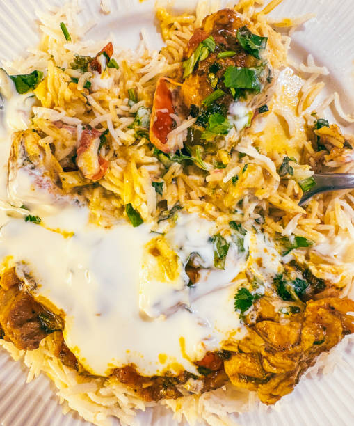 Iphone serie: light chicken curry with rice and yogurt.