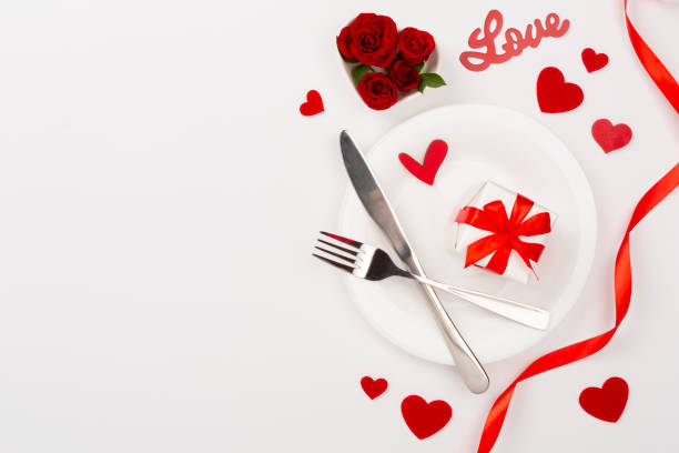 istock Table setting for Valentine's Day on color background, top view 2191683004