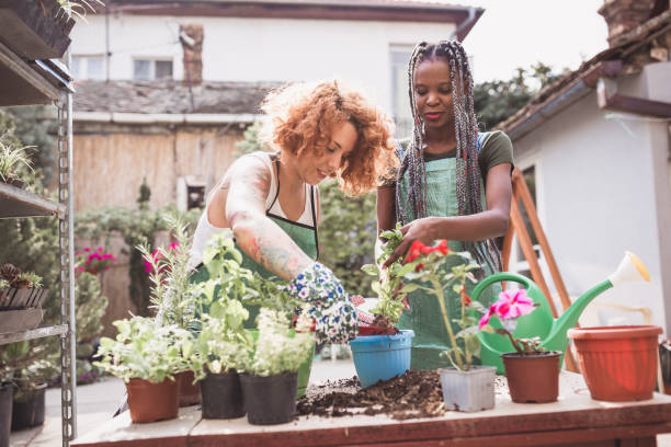 istock Gardening Together: Mother and Daughter in Backyard 2191685248