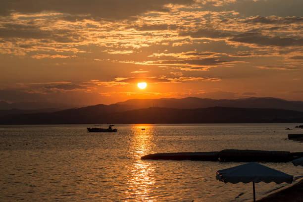 istock Dramatic sunset sky over the islands in the Aegean Sea, Greece. 2191685691