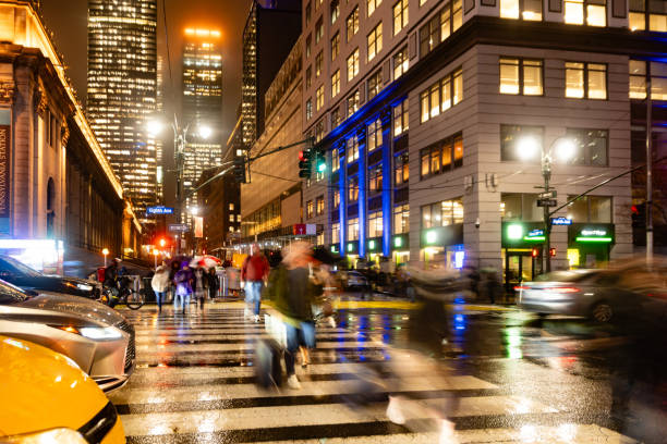 istock Motion Blurred Pedestrians Crossing Eighth Avenue in NYC 2191687260