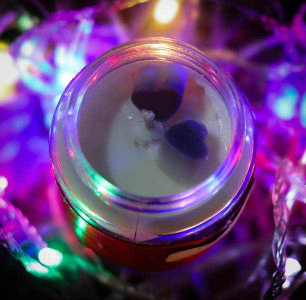 handmade candles and body cream in new year decoration