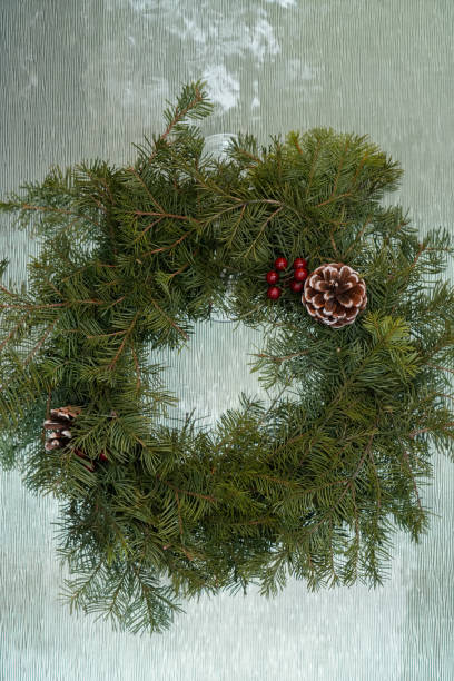 istock Christmas Wreath on Front Door (Vertical) 2191688405