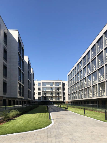 istock modern buildings with loggias, perspective, pedestrian path, green lawns 2191696503
