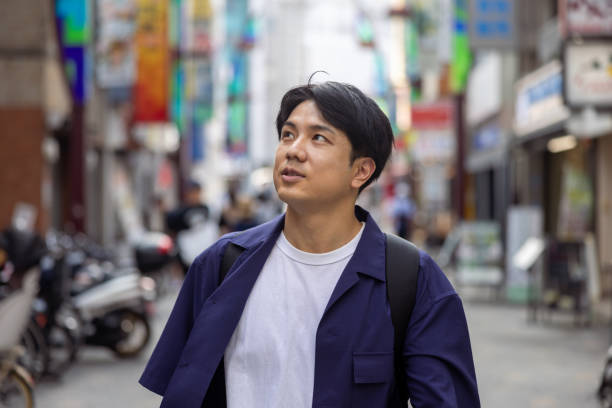 istock Japanese man walking in city 2191701279