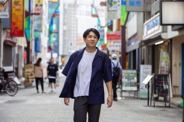 istock Japanese man walking in city 2191701286