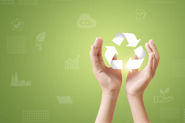 istock Hands holding a recycling symbol, promoting 2191705601