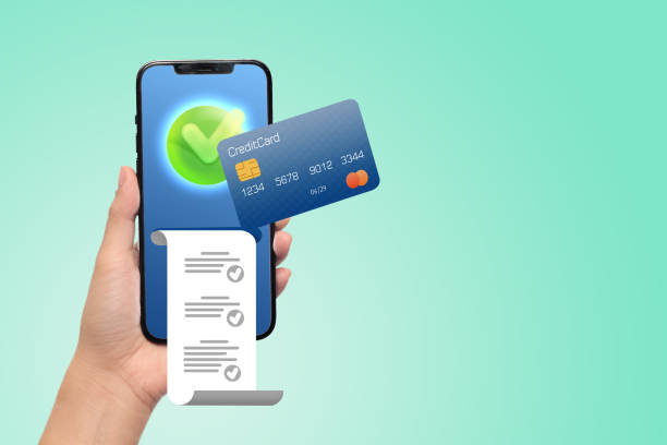 istock smartphone with a credit card and transaction receipt 2191705626