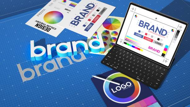 istock 3D render, branding elements, color wheel, logo concepts, tablet with design software, keyboard, vibrant colors, blue grid background, corporate identity, graphic design tools, creative workspace, professional marketing materials. 2191708204