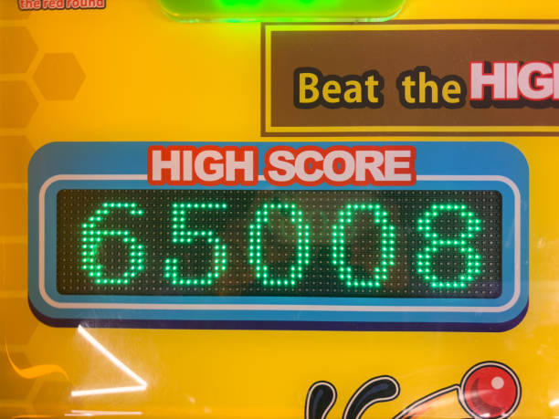 A high score sign with the number 65,8 on it. The sign is green and yellow