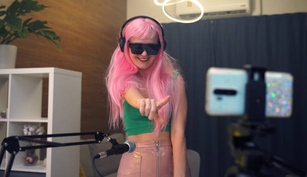 istock Beautiful young singer and musician broadcast from her home studio 2191714166