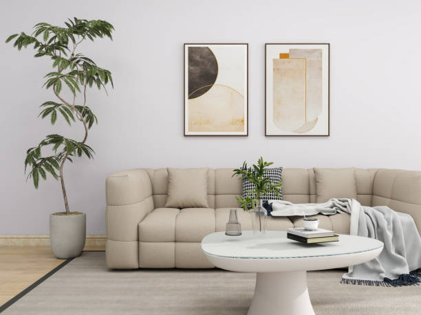 istock Modern living room with a beige tufted sofa, a sleek white coffee table, abstract wall art, and a potted plant in a minimalist design setting. Tight angle view. 3d rendering. 2191717648