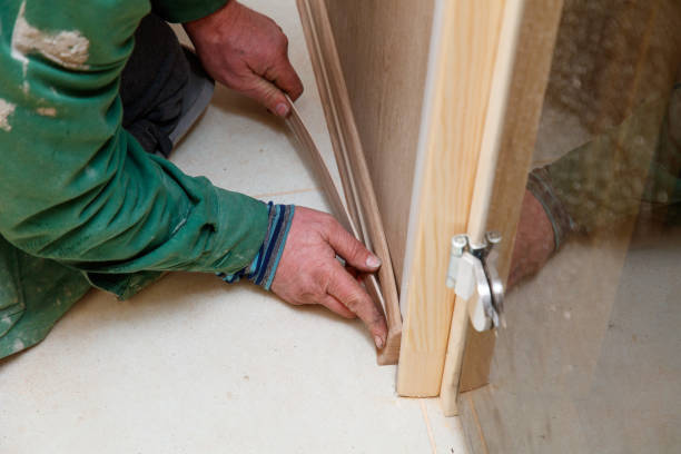 istock A man is working on a project, possibly installing a new door 2191718097