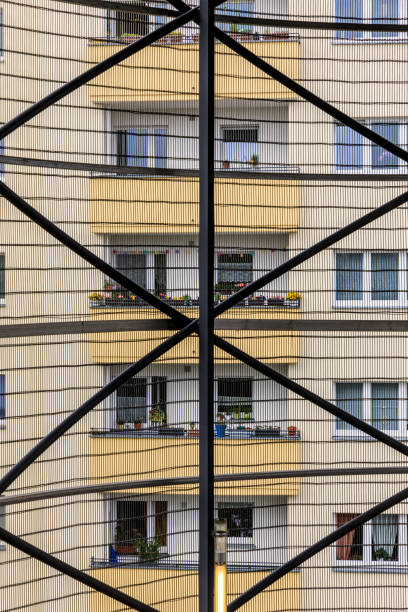 Germany, Berlin, Kreuzberg, August 13, 2024 -Full frame of a dilapidated apartment building
