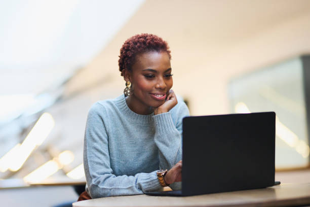 istock Focused Woman Working on Laptop 2191720442
