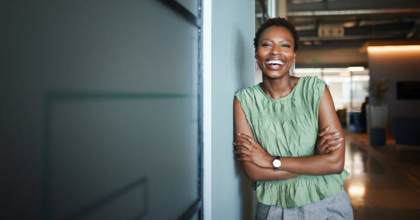 istock Confident Businesswoman Leaning and Smiling 2191721095