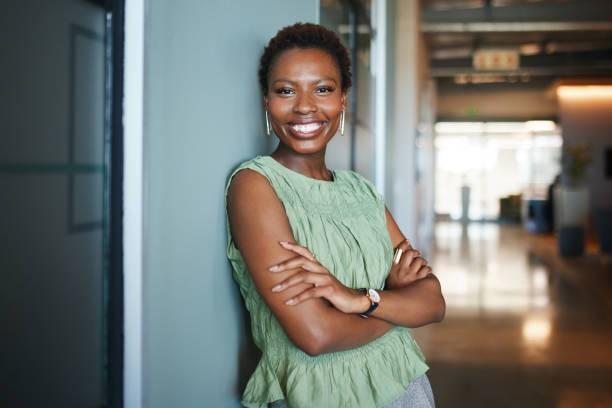 istock Confident Businesswoman Leaning and Smiling 2191721099
