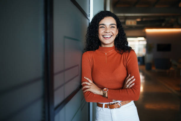 istock Confident Woman Laughing in Modern Office 2191721113