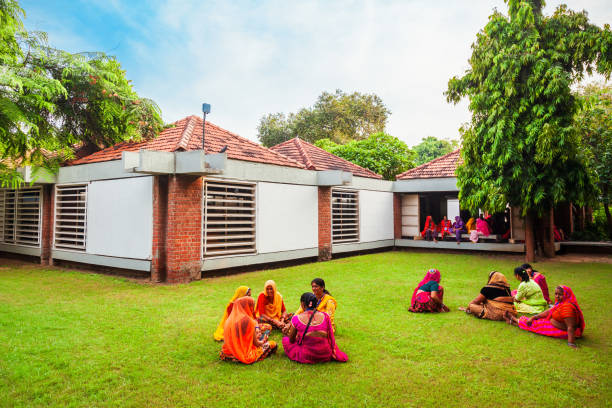 AHMEDABAD, INDIA - SEPTEMBER 23, 2019: Unidentified pilgrims at the Sabarmati Gandhi Ashram or Harijan Ashram in Ahmedabad city in Gujarat state of India