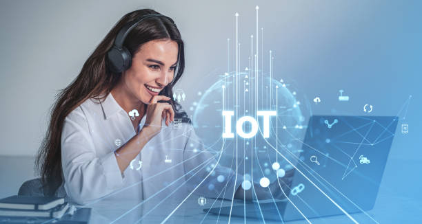 istock Woman using laptop with IoT technology icons, representing globa 2191723450