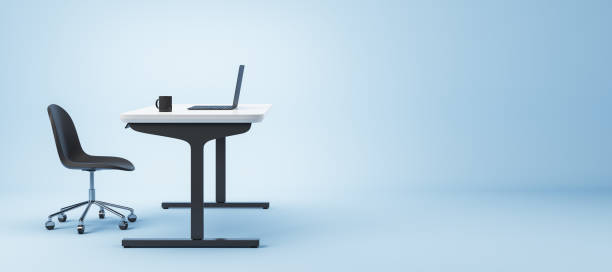 istock Minimalistic modern workstation with black chair, white desk, laptop, and coffee cup on gradient blue background. 3D Rendering 2191726644