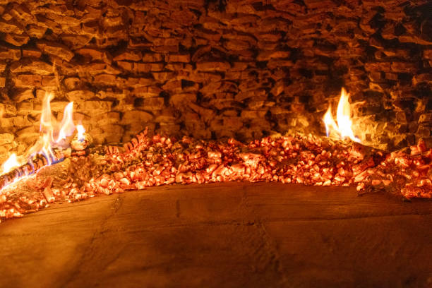 Glowing Embers and Flames in a Traditional Wood-Fired Oven