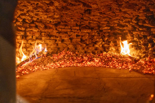 istock Traditional Wood-Fired Oven Ready for Rustic Restaurant Guests 2191727796