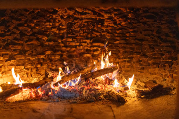 istock Burning Logs in a Traditional Wood-Fired Oven 2191727870