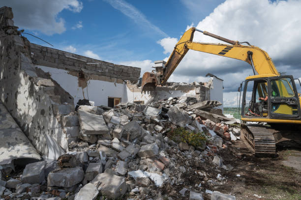 istock An excavator demolishes a building 2191728264