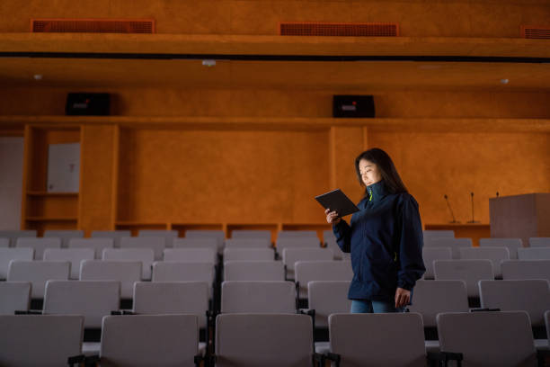 istock Asian women are using tablets in a small theater. 2191743994