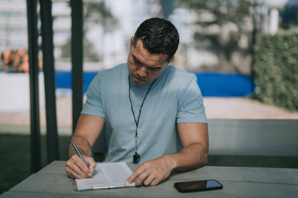 istock Australian male coach planning for netball team strategy 2191745525