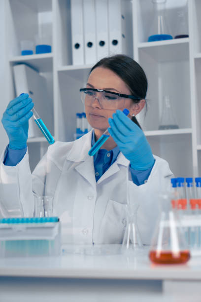 istock A scientist analyzes test tubes in a hightech lab, conducting research that advances biotechnology and chemistry, merging education with innovation for impactful societal results 2191747123