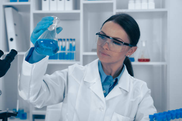 istock A dedicated scientist analyzes a complex chemical reaction in a laboratory, providing insights that significantly contribute to biochemistry and healthcare through precise experimentation 2191747879