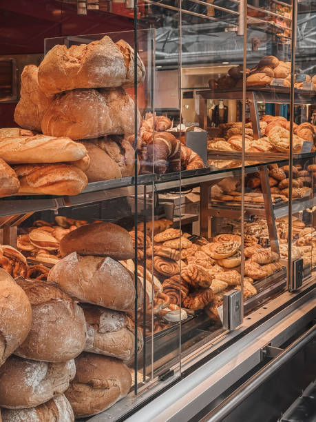 istock Freshly baked bread and pastries displayed in the bakery window 2191749902
