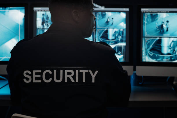 istock Guard observing cctv video in hotel 2191755418